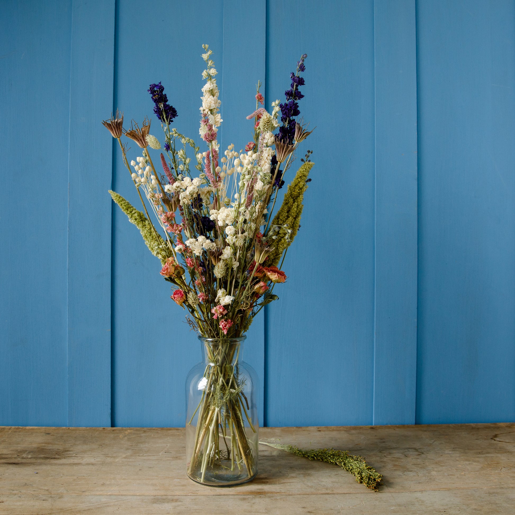 Our dried flower bouquet in muted pinks, available as both a 'arrange at home' gift box or a hand-tied bouquet.